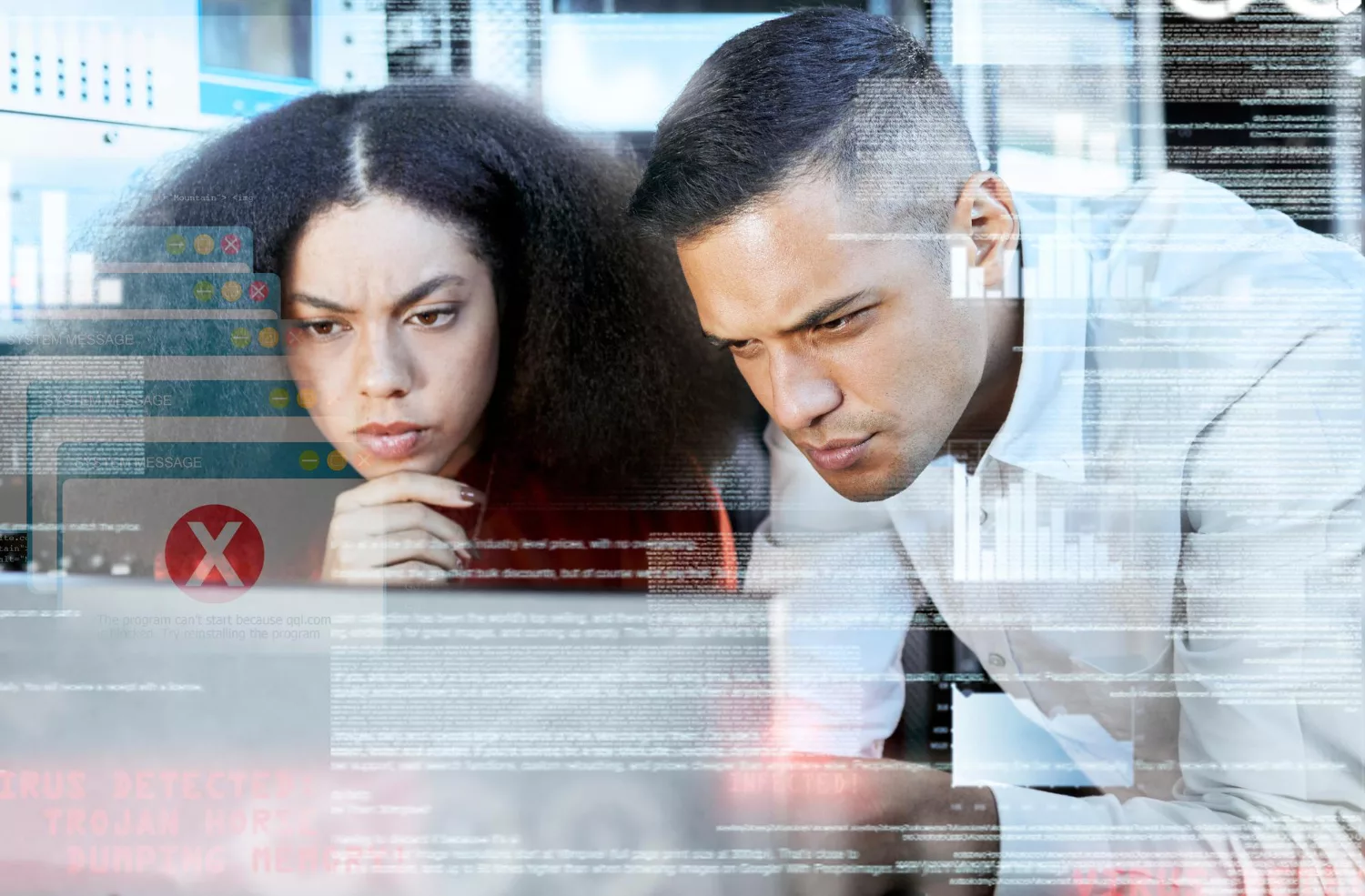 Professionals analyzing data on a computer screen, illustrating what is cyber liability insurance.