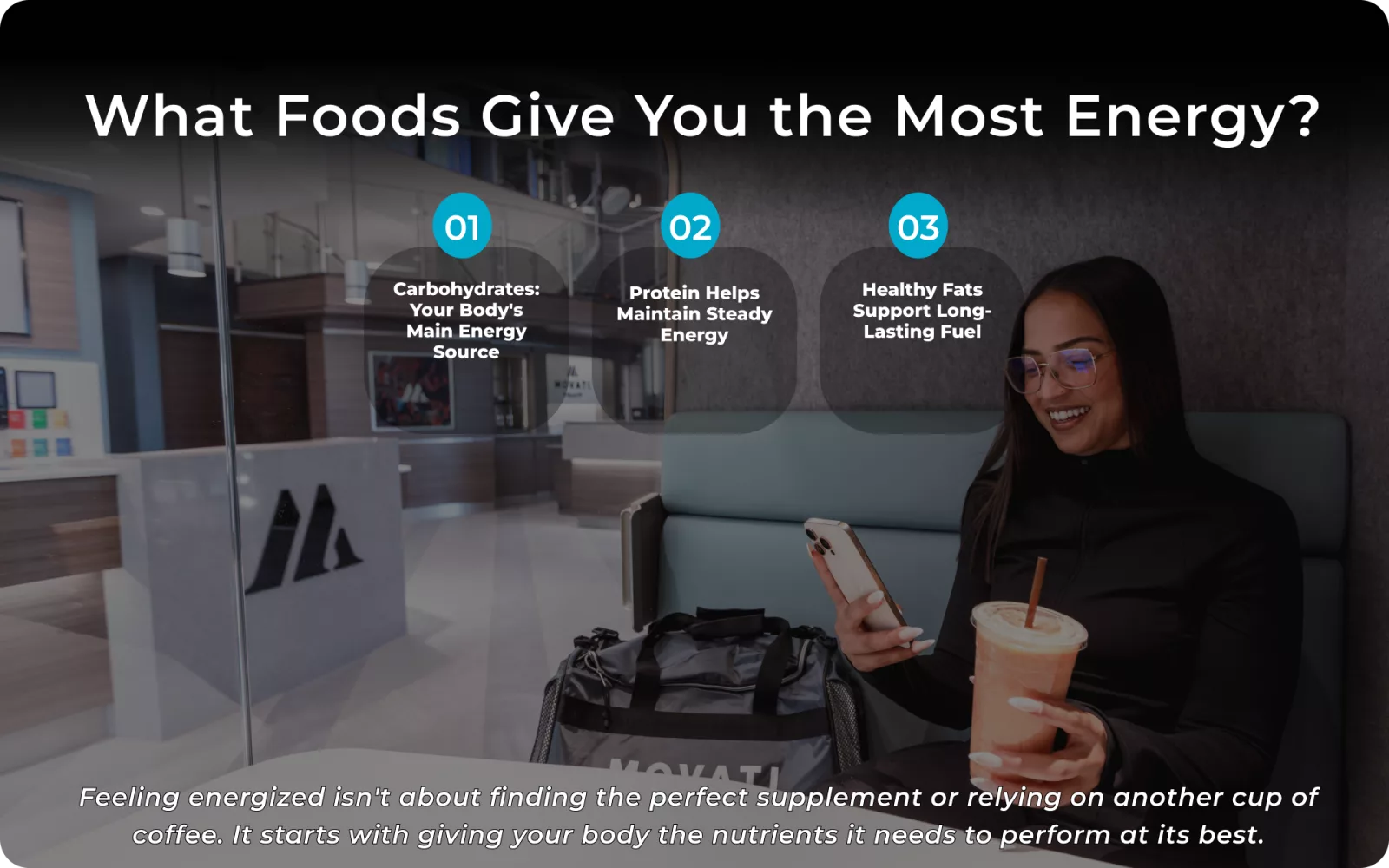 Woman enjoying a smoothie while reading about nutrition for better energy in a modern cafe setting.